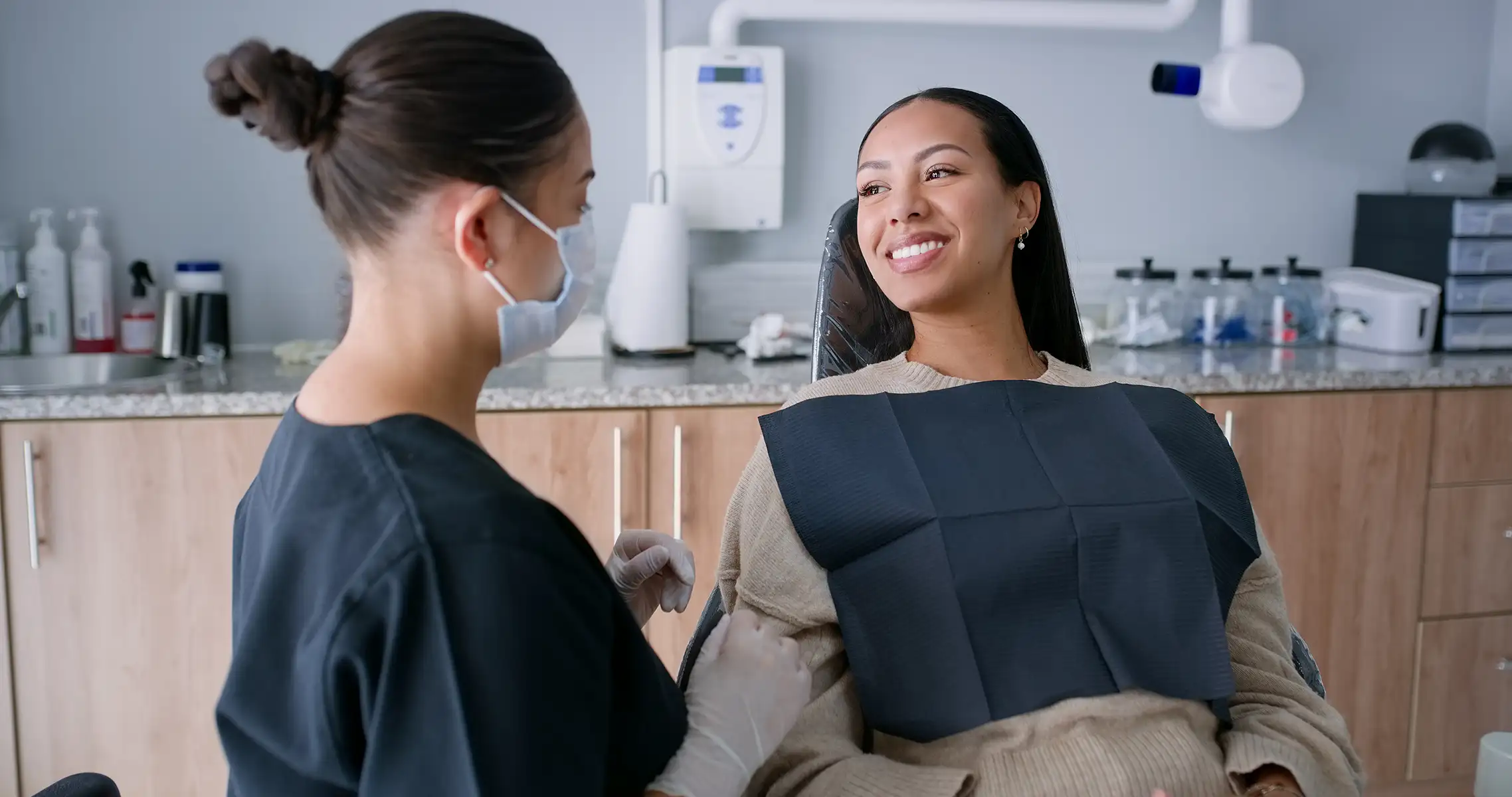 oral surgeon consulting with a patient